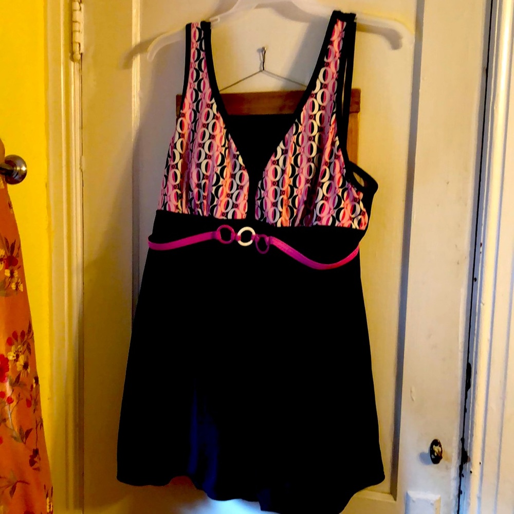 . Bathing suit pink white black are its. Color